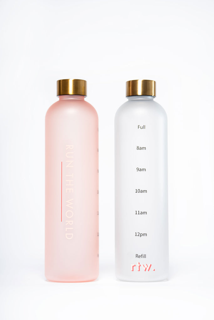 Run the World Self Made Summit water bottle in clear and pink